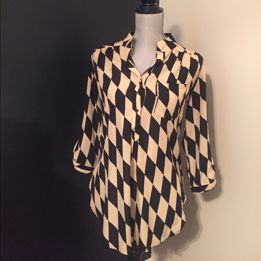 Black/tan harlequin pattern blouse.