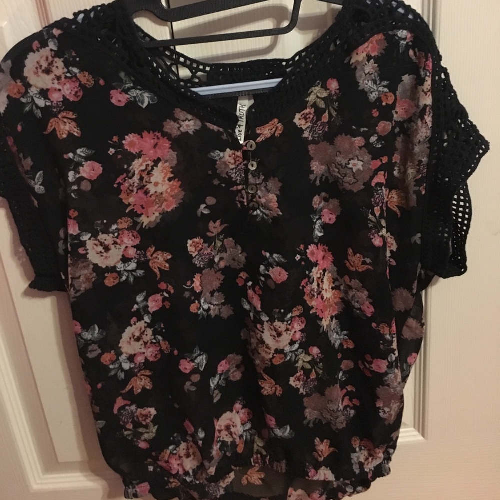 Black blouse with pink flowers