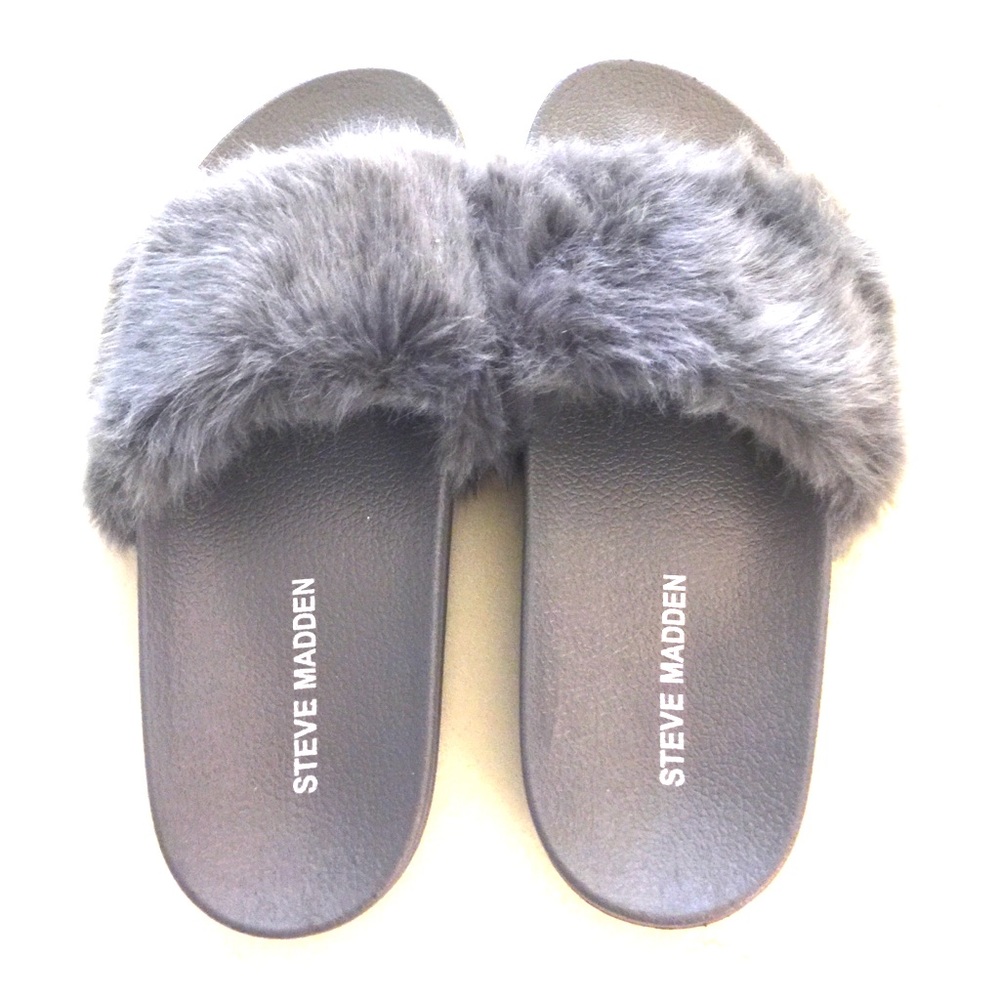 Grey Steve Madden slides with fur