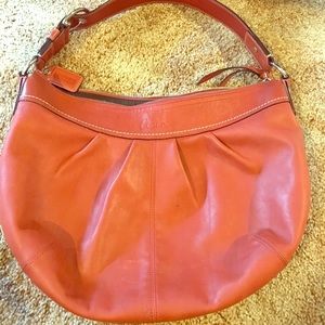 Coach leather zipper hobo in rust