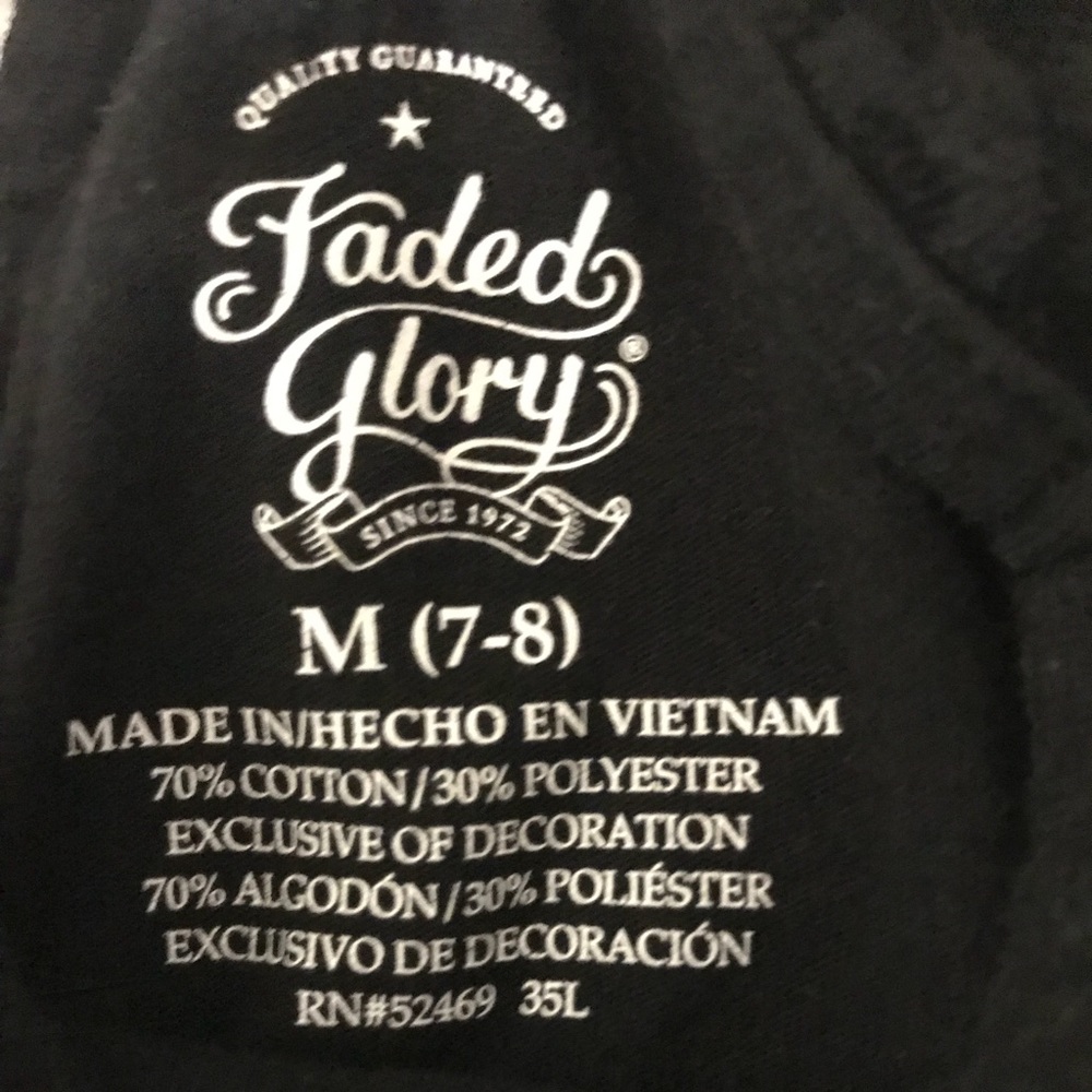 Black children’s shirt size medium 7-8