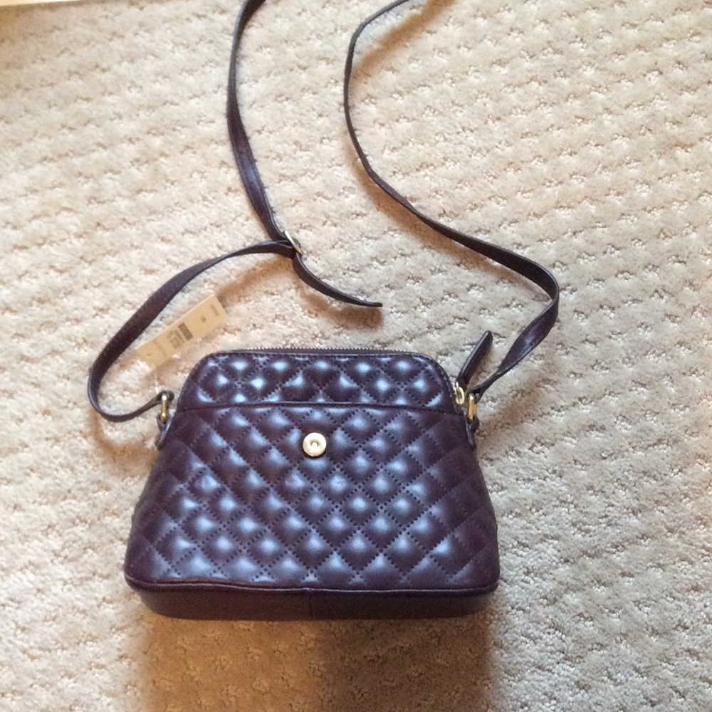 Plum, cross body purse. Never used!