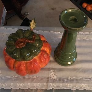 Pumpkin soup holder and holder with candle holder.
