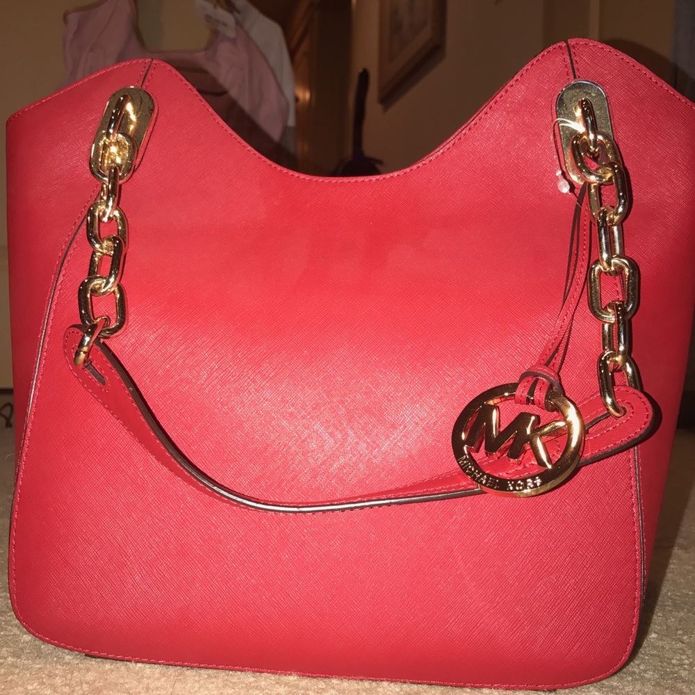 Red Michael Kors bag, NWT.