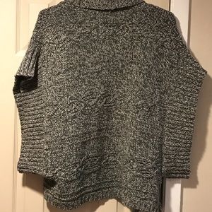Grey and white sweater cape