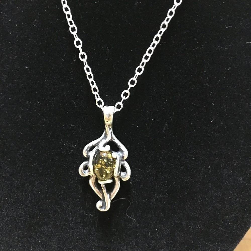 Amber and silver pendant necklace.