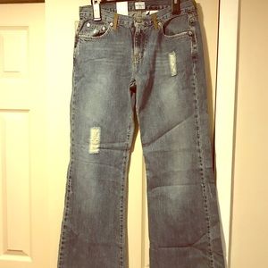 Calvin Klein Distressed wide legged Denims