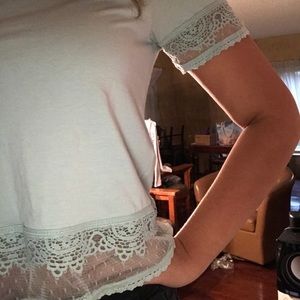 Turquoise lace accented lace shirt