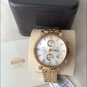 Gold fossil watch
