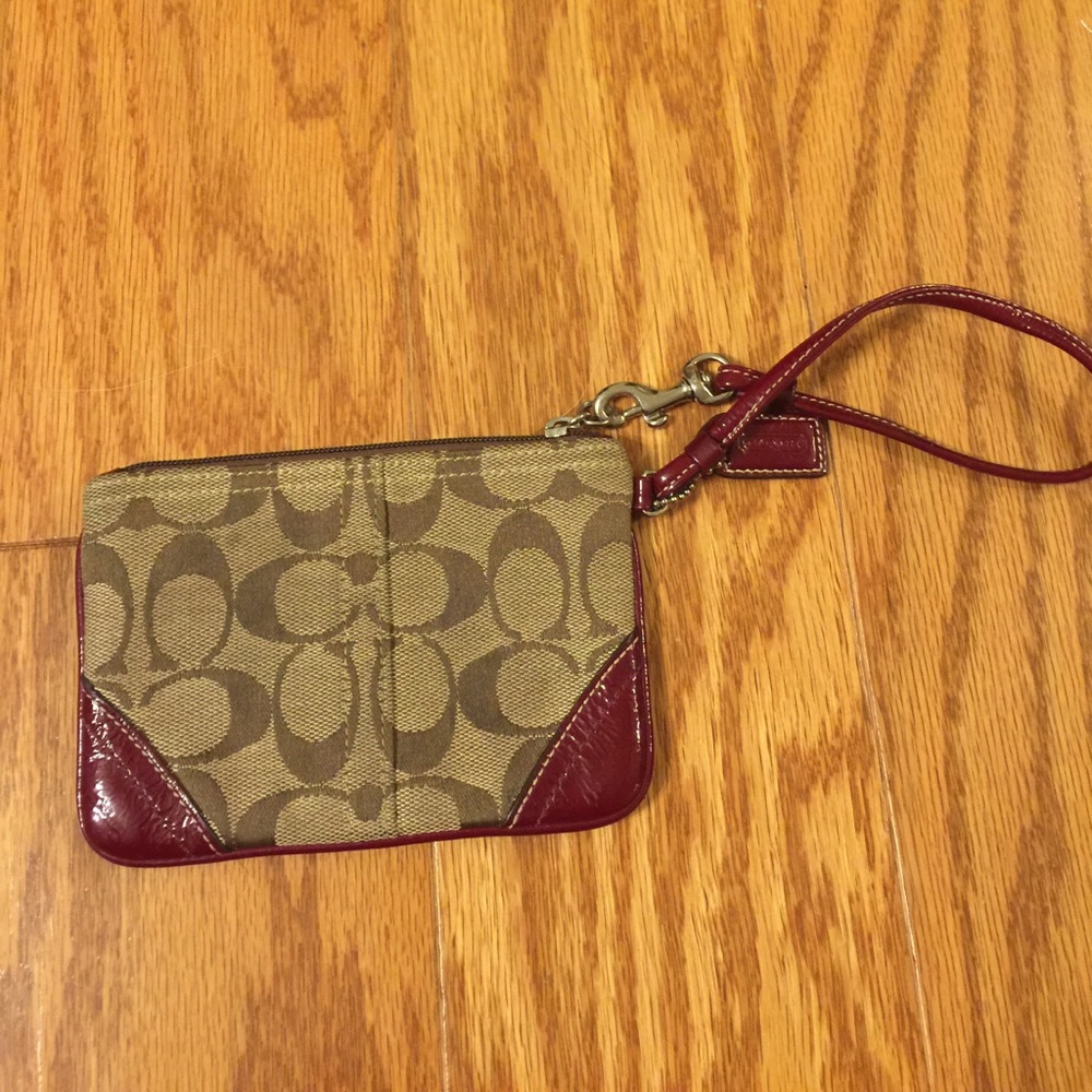 Coach signature wristlet with red patent trim