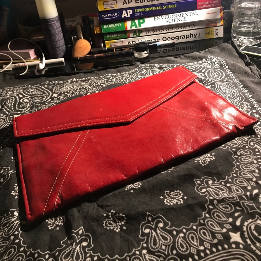 Red faux leather hand purse