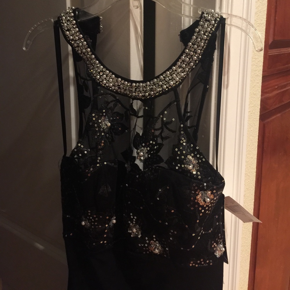 Black cocktail gown with beads,pearls and sequence