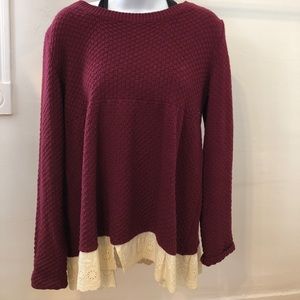 Knitted sweater with ruffles