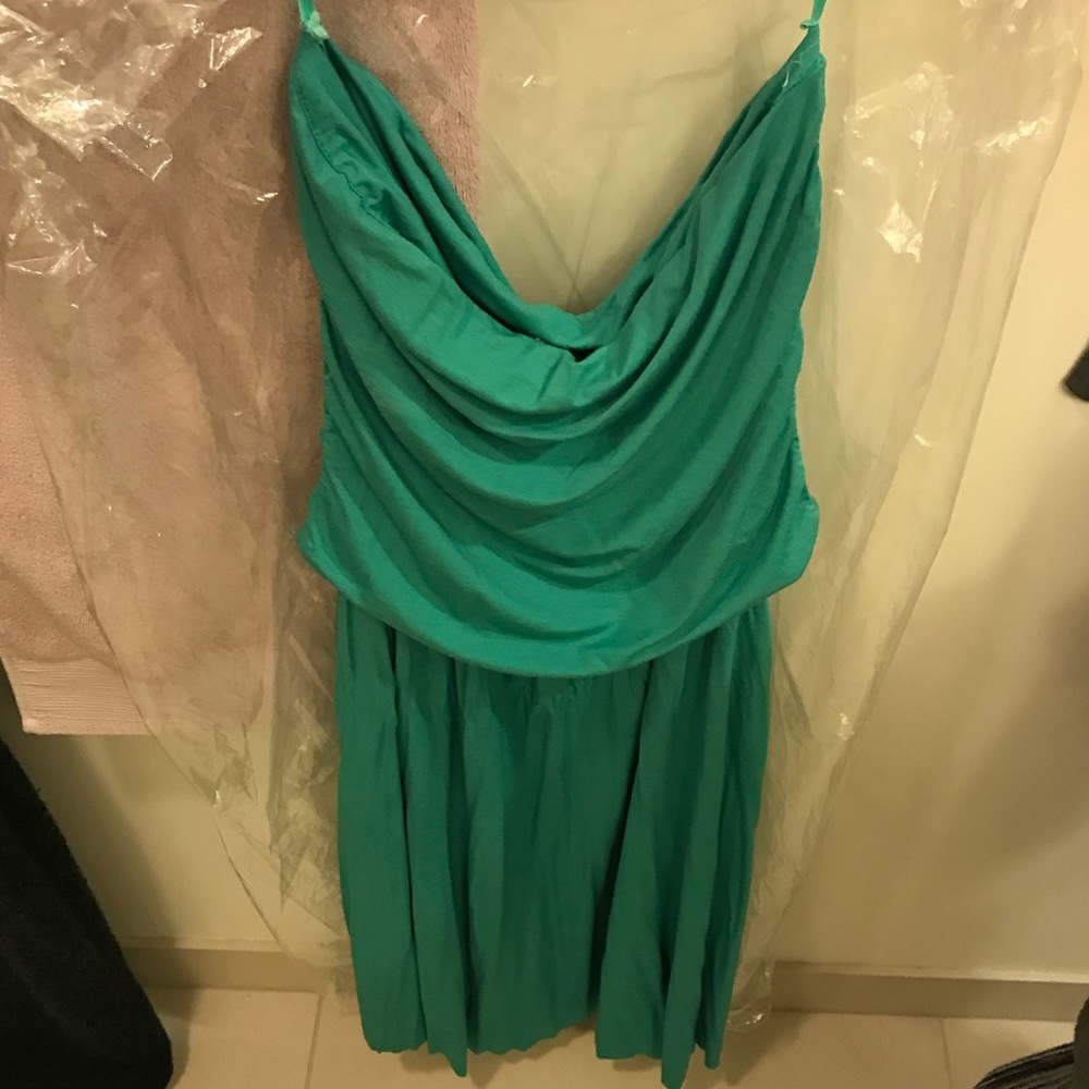 Sleeveless Tea length dress with pockets