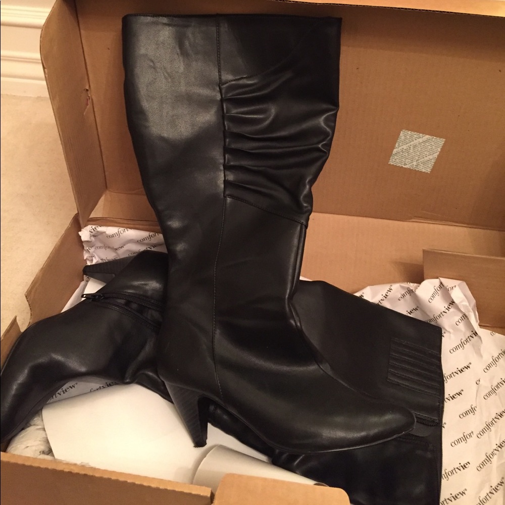 Black Knee high boots.