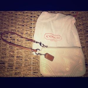Coach white pebble leather wristlet