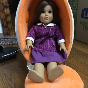 American girl doll with stereo egg chair set