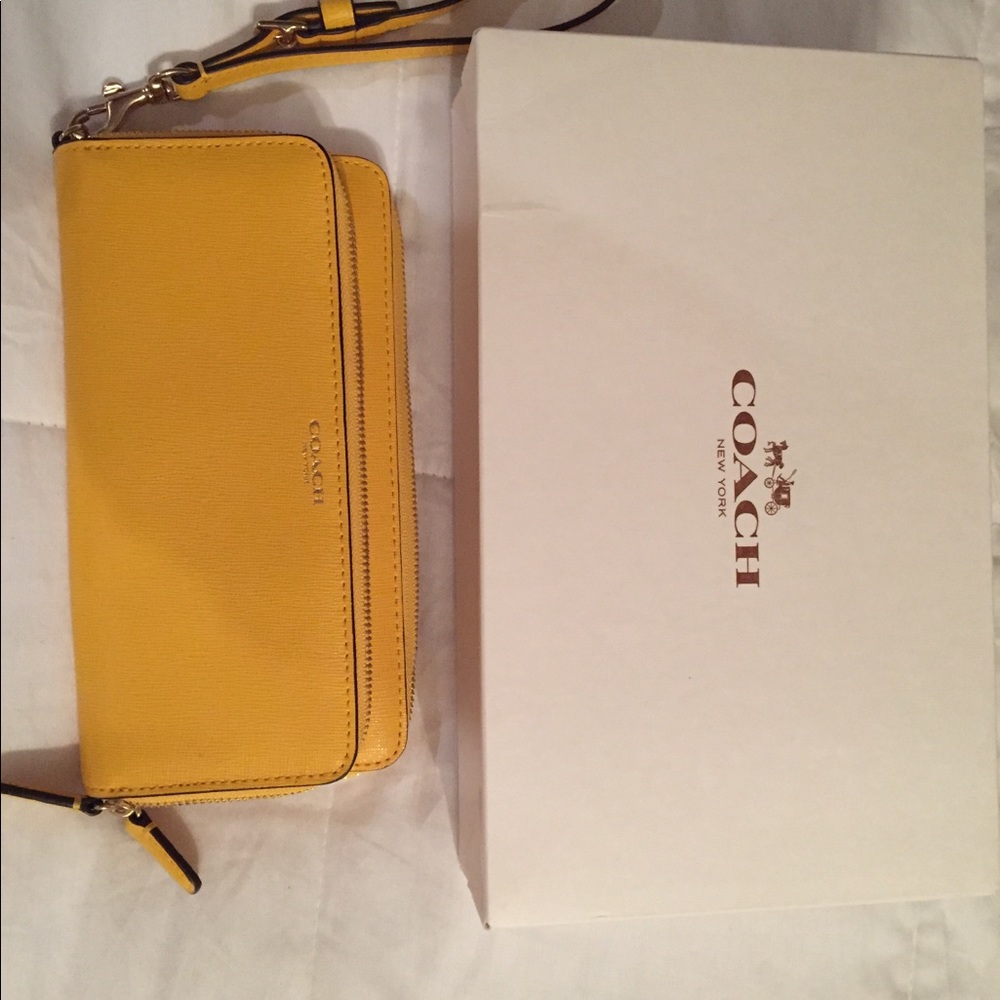 Original Coach wristlet/wallet w/ tags. Brand new!