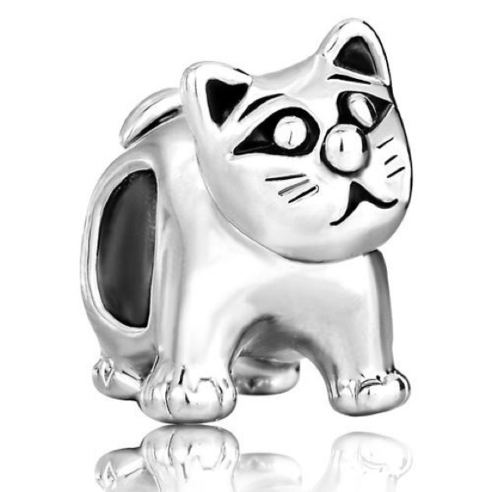 Cat charm silver plated. New in orig packaging