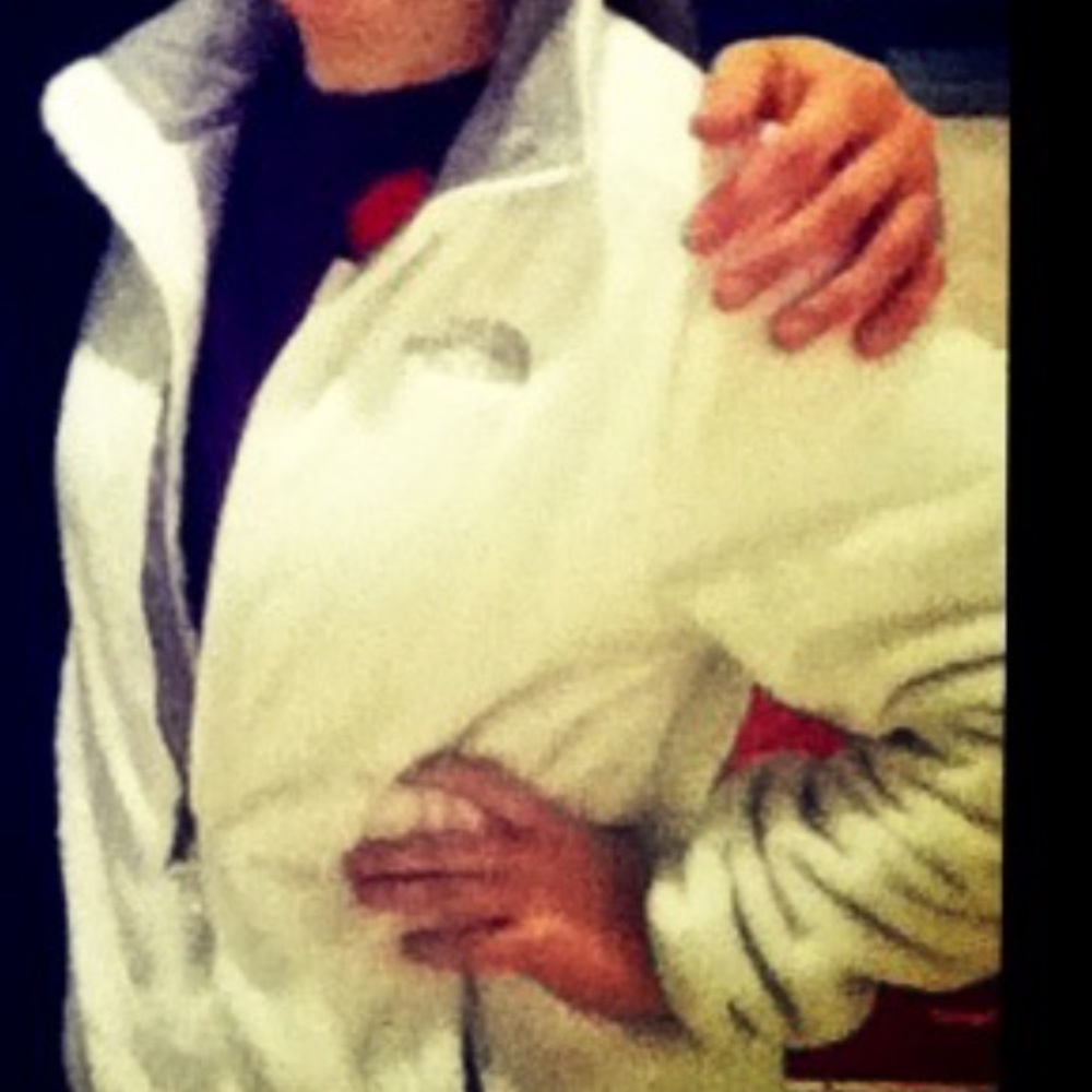 White fuzzy north face