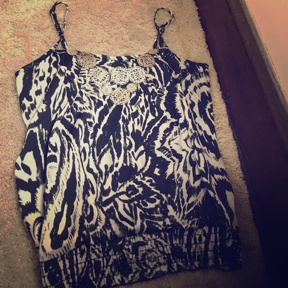 Black and white zebra print tank.