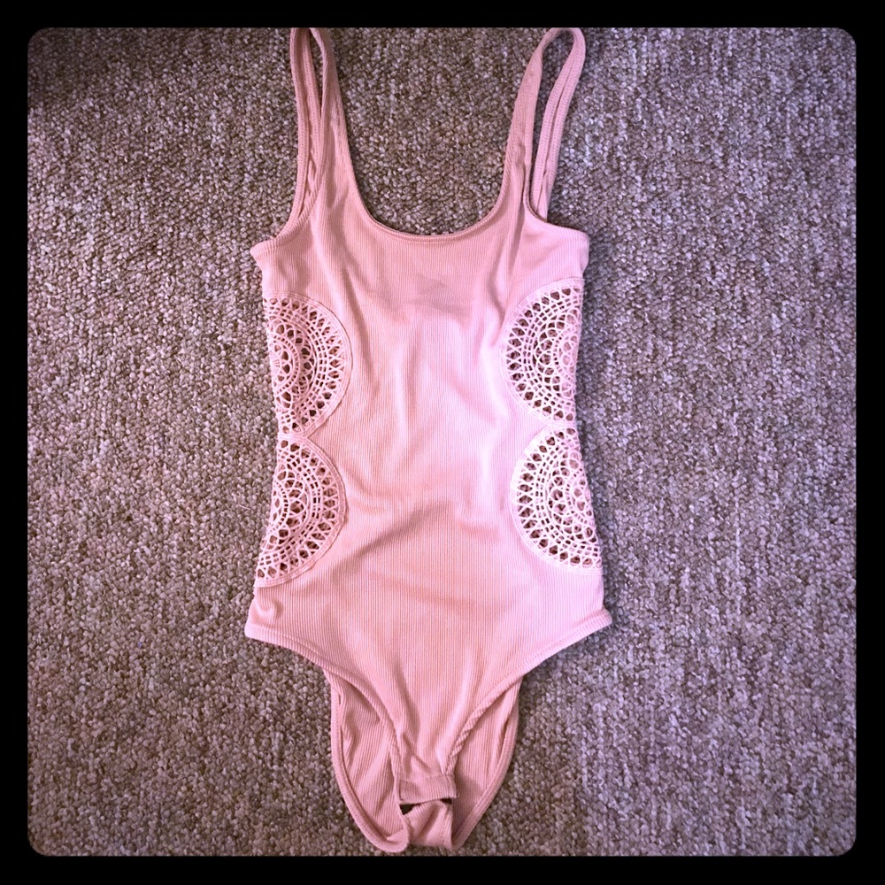 Pink body suit