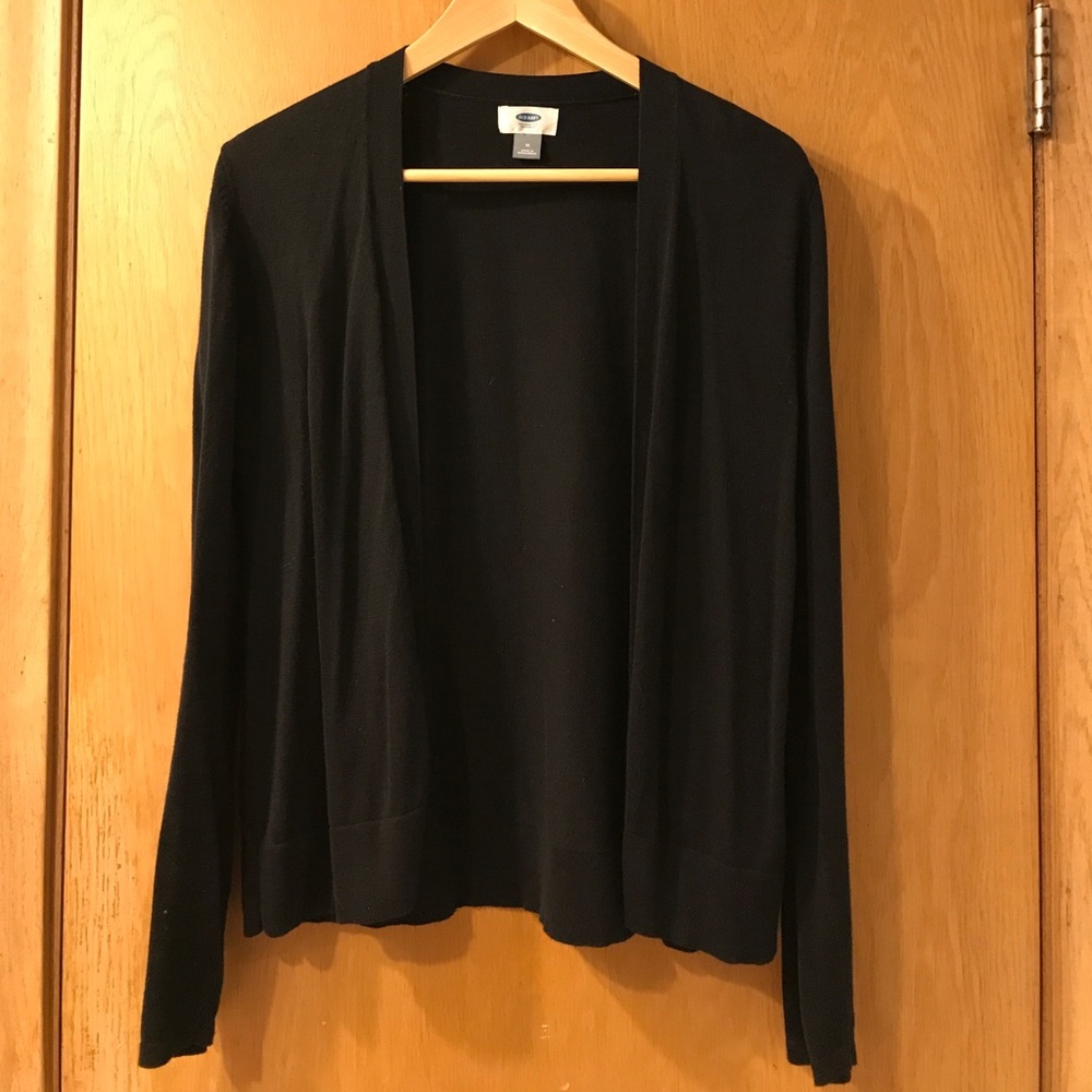 Waist length, buttonless black cardigan