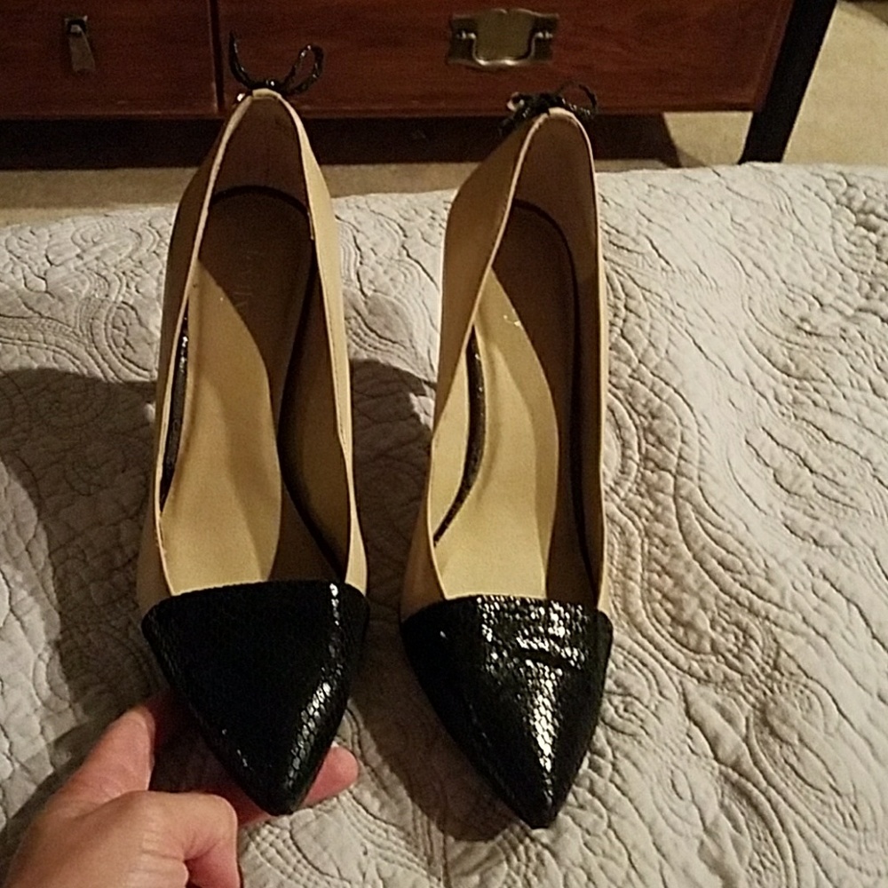 Tan and black heels