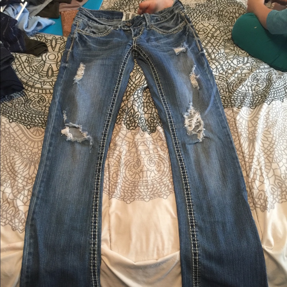 Distressed flare leg jeans