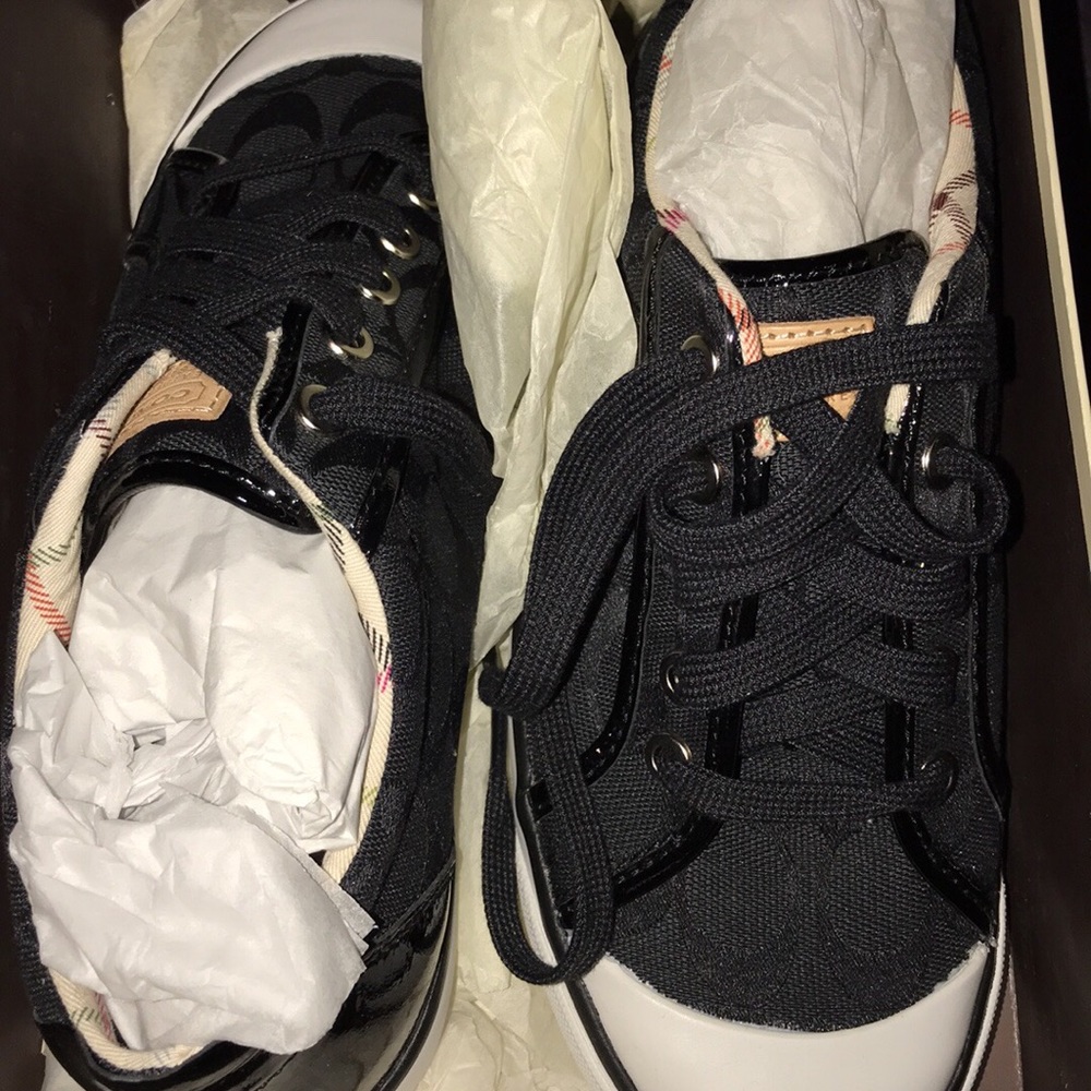 Brand new Coach snickers size 8 in black