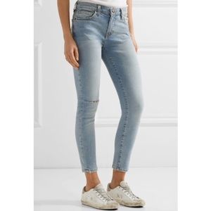 High waisted destroyed light wash jeans