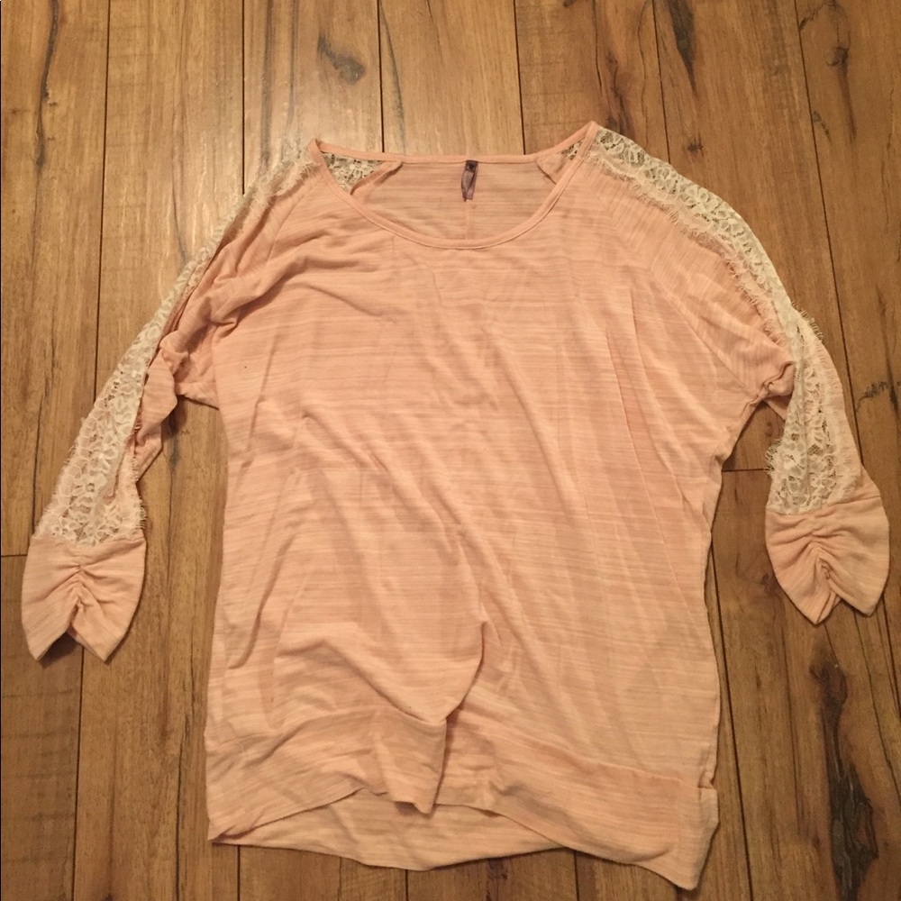 shirt with lace sleeve.