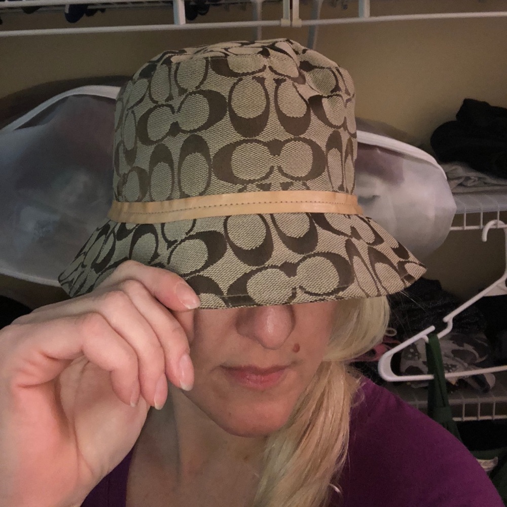 Coach hat. Brown and tan signature logo.