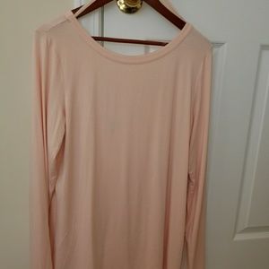 Long sleeve stretch top. Peach color