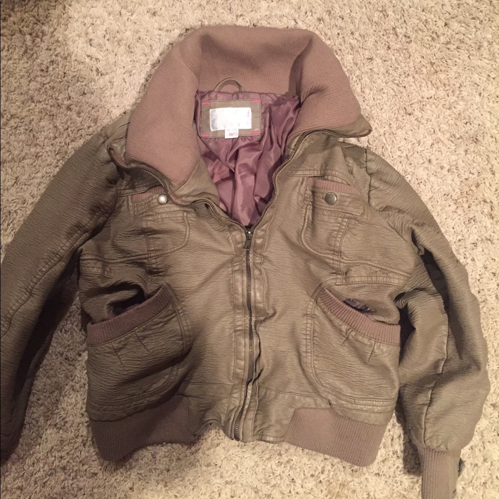 Tan colored leather jacket matches everything