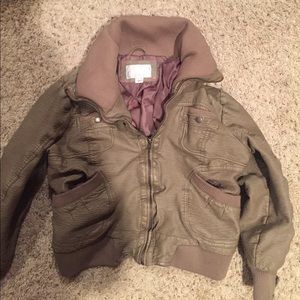 Tan colored leather jacket matches everything