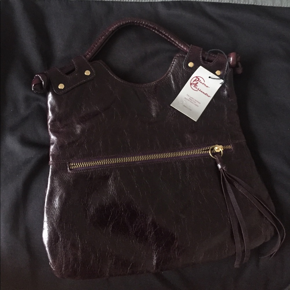 Pictor Alessandro purple leather mini satchel.
