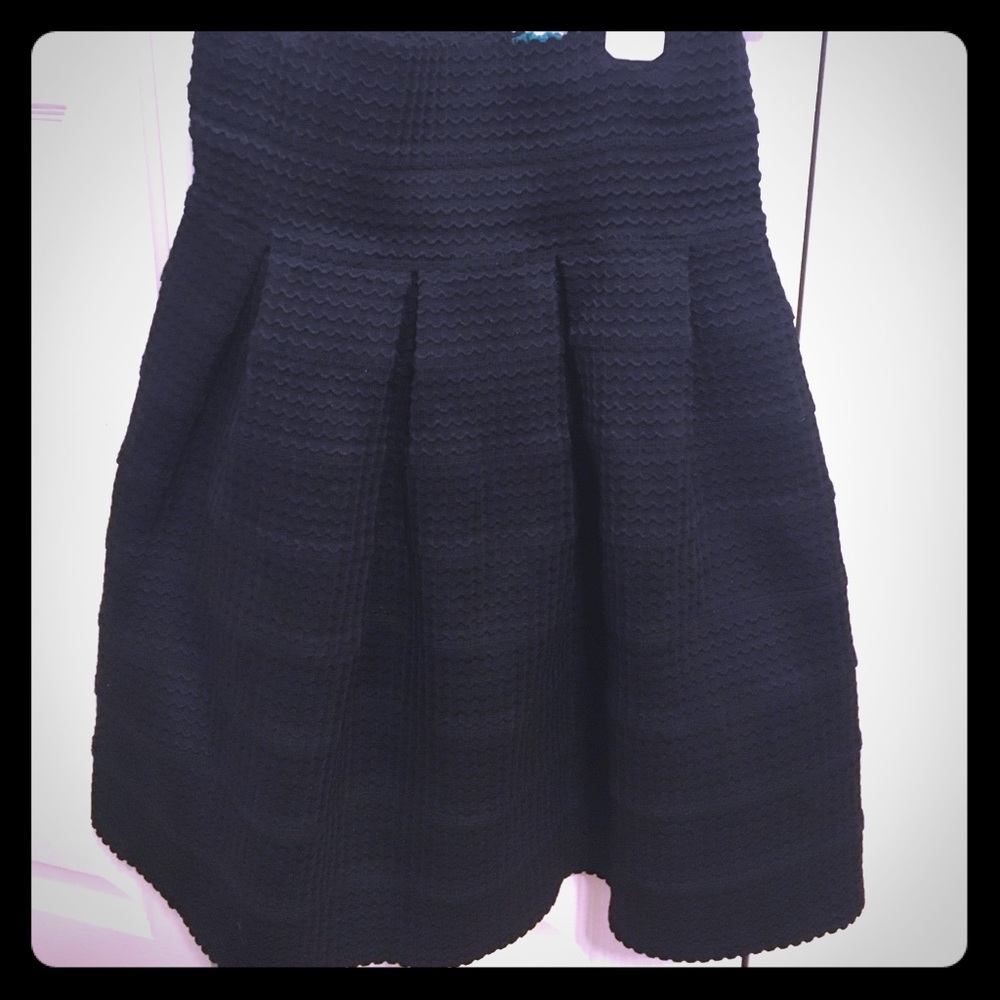 Black high waisted “bubble” skirt