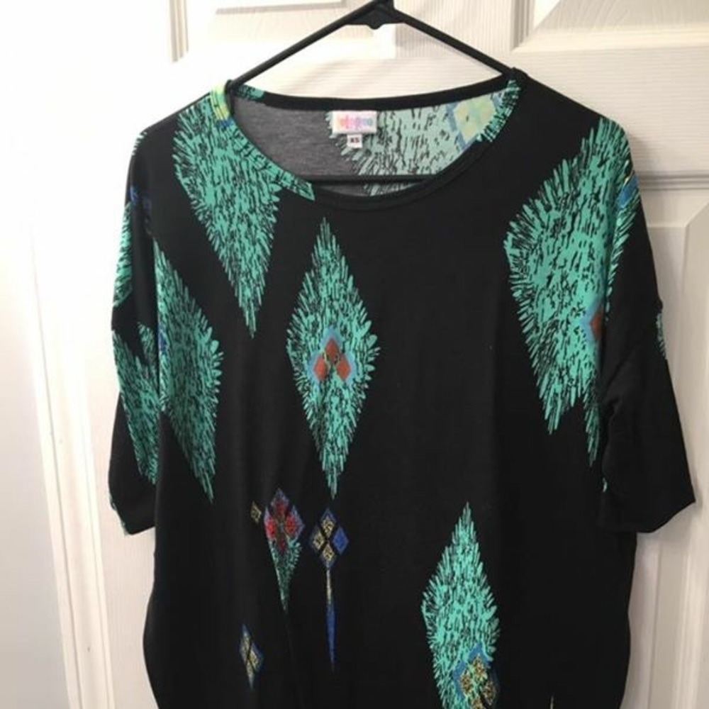 XS peacock Irma