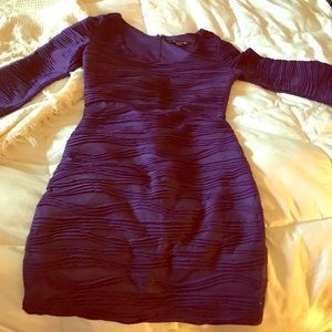 Gorgeous purple textured 3 quarter length dress
