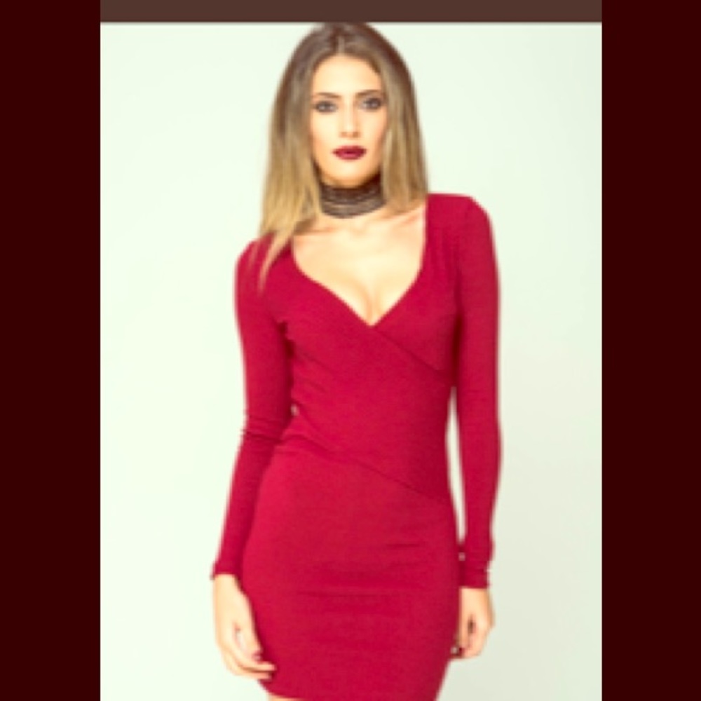 Burgundy sweater dress deep V neck hugs the body