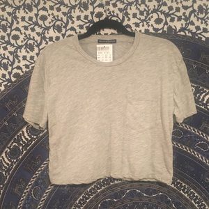 Brandy Melville “Cooper” cropped pocket tee