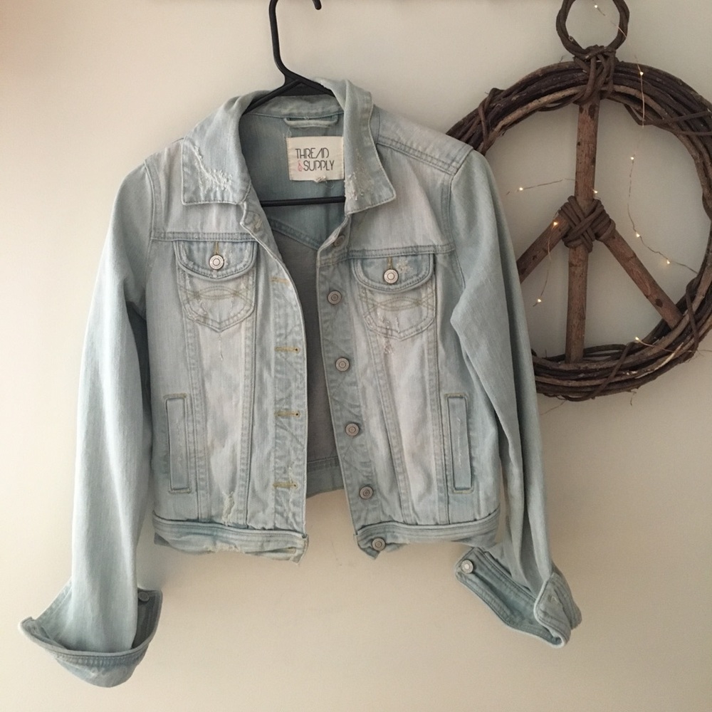 Medium distressed denim jacket.