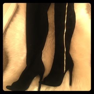 Thigh high black boots with heel