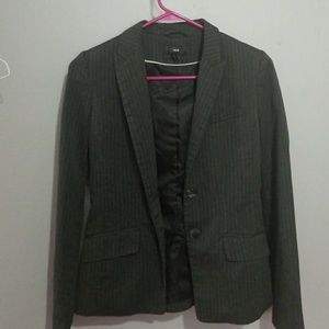 gray blazer with white slim strips