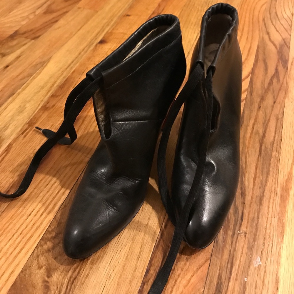 DVF heeled booties with red accent