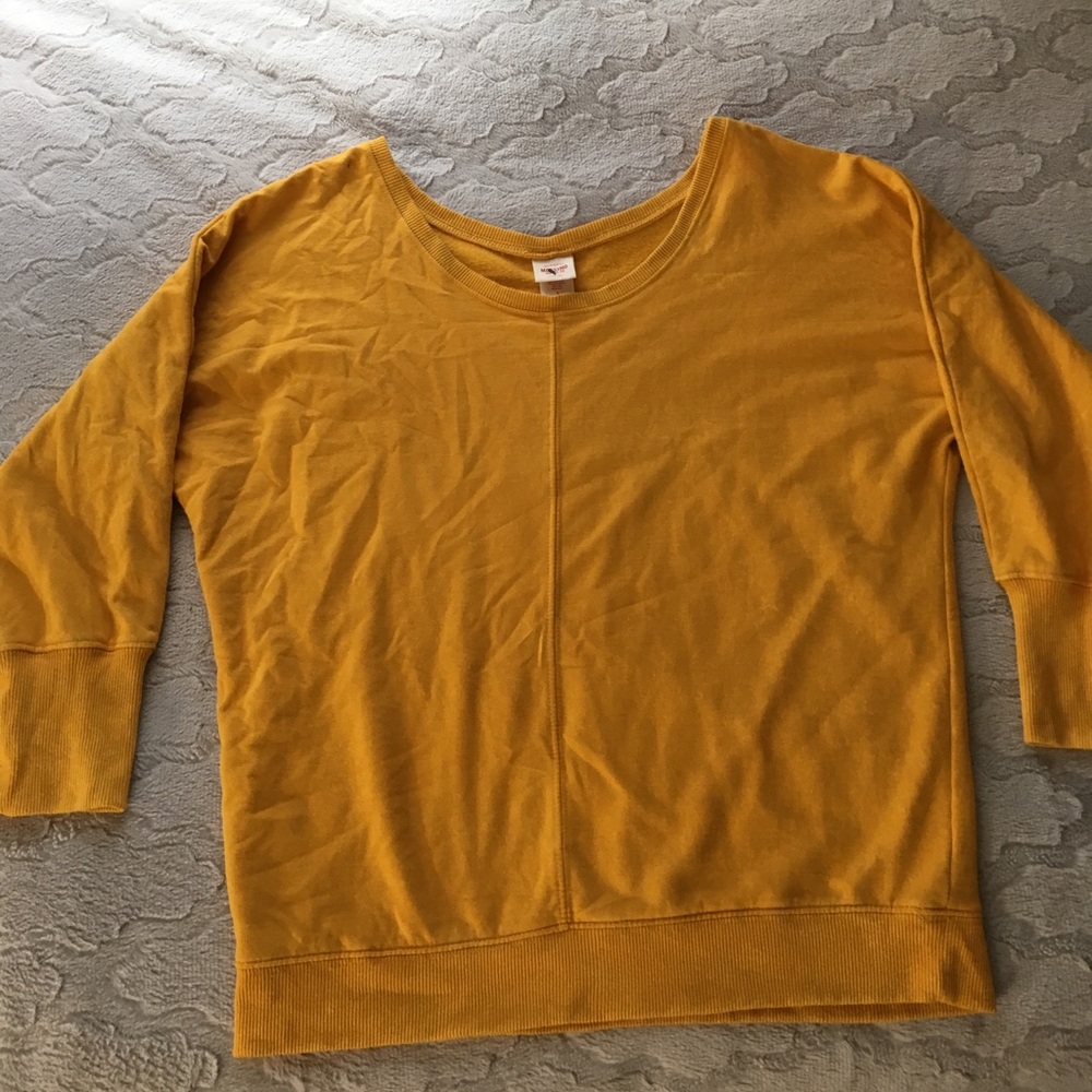 yellow sweater