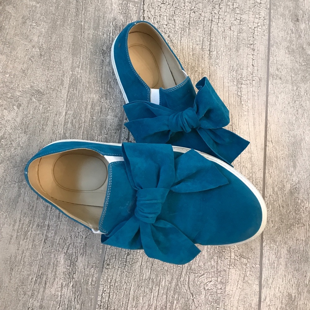 Blue suede shoes with bow tie