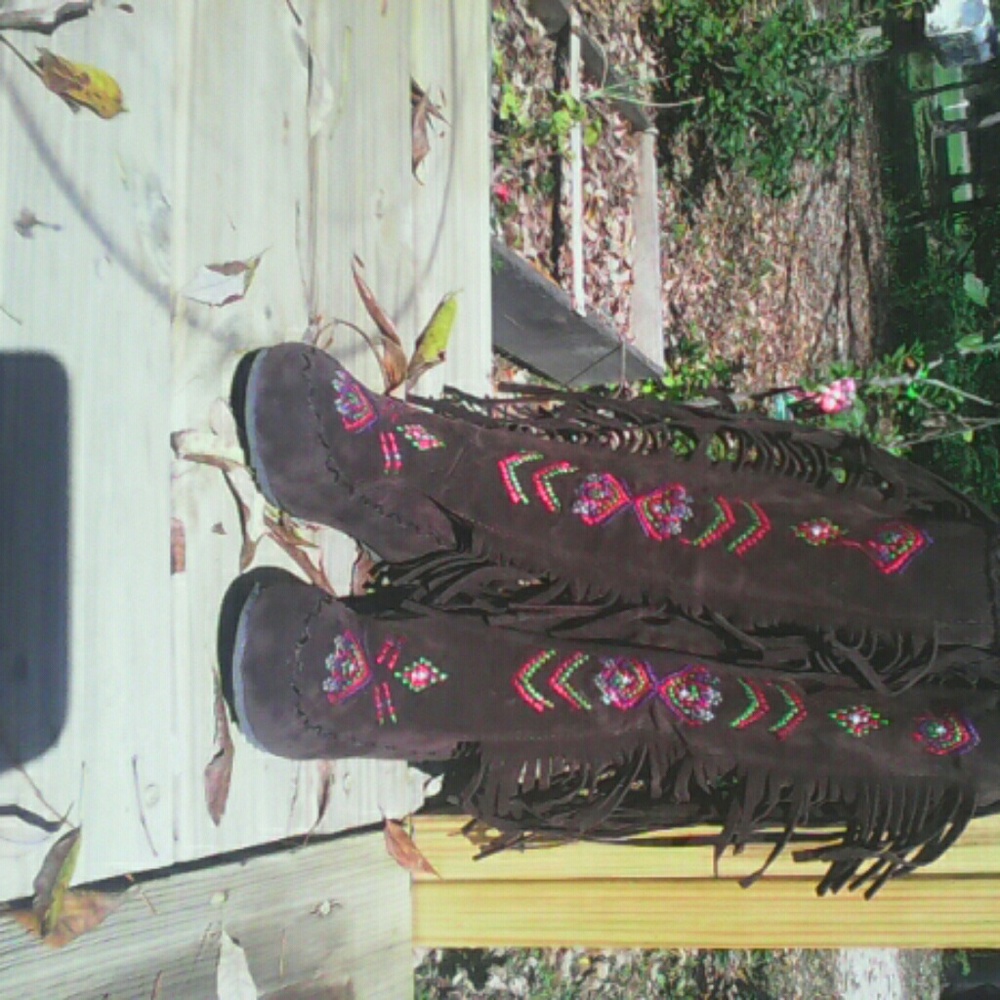Leather boots with embroidery , fringe