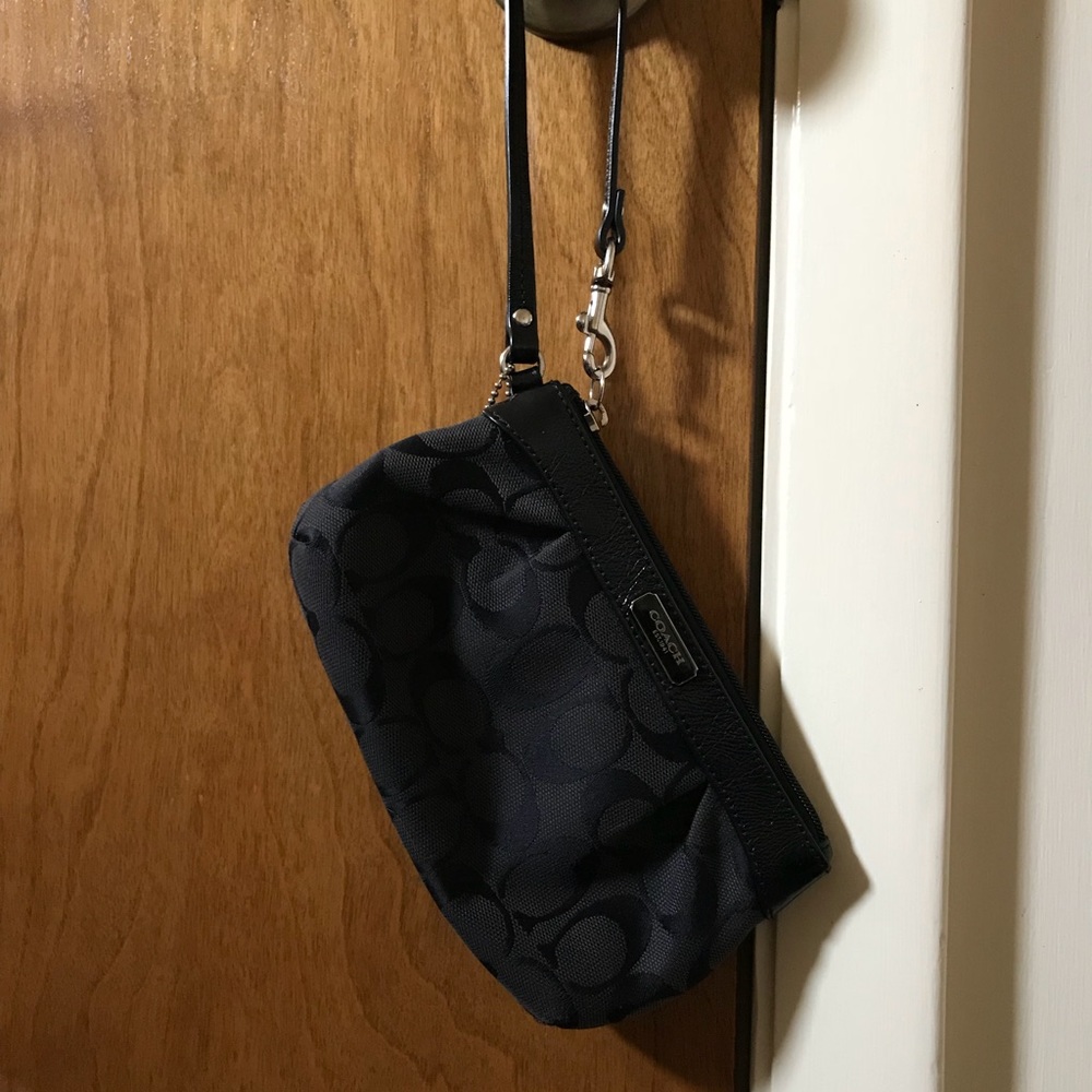 Coach black clutch/wristlet . Perfect condition
